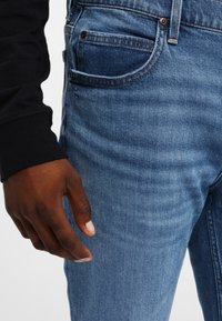 Lee RIDER - Slim fit jeans - dark blue
