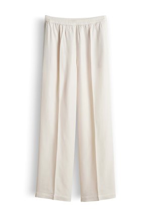 Beige wide-leg pants with elastic waistband and no visible pockets, displayed against a white background.
