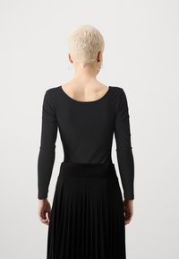 ONLY Petite ONLLIVE LOVE PLACKET - Topper langermet - black