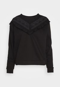 Sudadera negra con un diseño de encaje y volantes en el cuello. Presenta mangas largas y un corte relajado. Textura de tela suave.