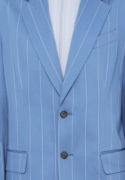 Light blue striped blazer with narrow white stripes, two black buttons, and a single chest pocket. Smooth fabric and structured design.