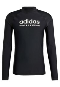 Rash guard nero a maniche lunghe realizzato in tessuto elasticizzato, con colletto alto e grande logo bianco Adidas sul petto.