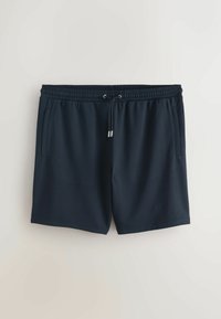 Short de sport noir en mesh avec une ceinture élastique, un cordon de serrage et des poches latérales, présenté sur fond blanc.