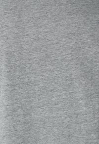 Cotton fabric in light gray, featuring a fine vertical stripe pattern. The texture is smooth with subtle variations in shading.