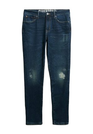 Donkerblauwe denim jeans met een slim fit, voorzien van versleten stukken en vervaging. De tailleband toont het 'Superdry' logo.
