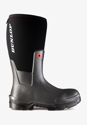 Dunlop waterproof boot with a smooth black rubber body, textured gray accents, sturdy grip sole, and a logo detail near the top.