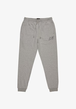 Grijze sweatpants van een katoenmix. Voorzien van een elastische tailleband met koord, taps toelopende manchetten en een klein logo op de linker bovenbeen.