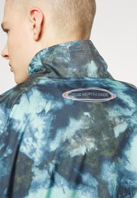 The North Face Veste coupe-vent - mint