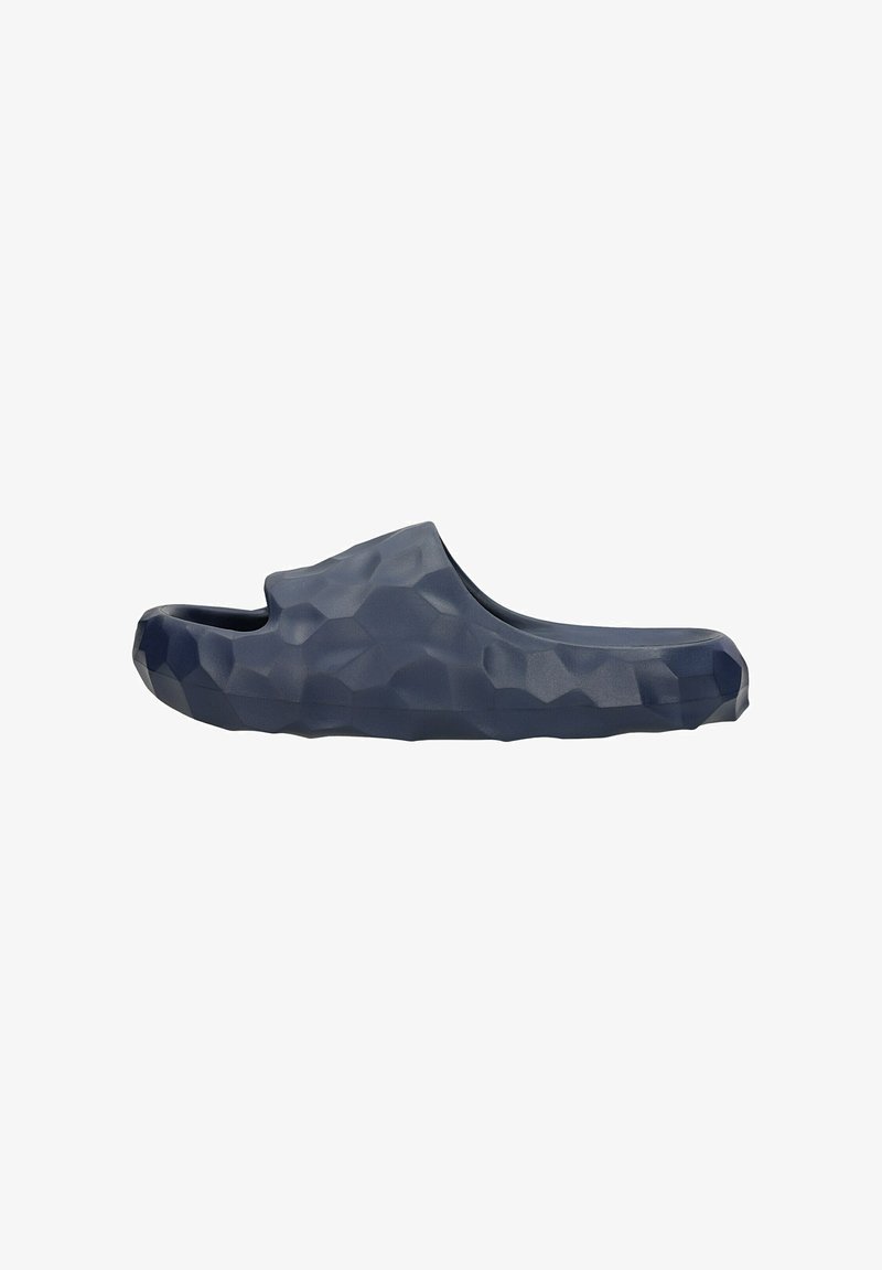 Navy blue slip-on clog made of textured material with a geometric pattern, featuring an open back and a rounded toe design.