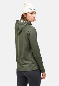 Green performance hoodie with a drawstring hood, featuring contrasting white text at the collar and smooth, lightweight fabric.