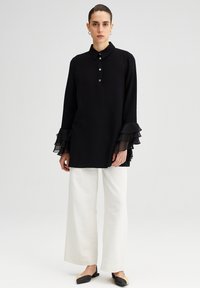 Touché Privé FRILLY ARMED  - Tunika - black