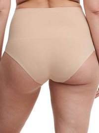 High-waisted nude undergarment with a smooth, stretchy texture. Features elastic waistband and seamless design for comfort and coverage.