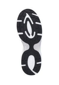 Semelle de chaussure de sport noir et blanc avec un motif de relief triangulaire, surface texturée pour l'adhérence et un design découpé prominent au centre.