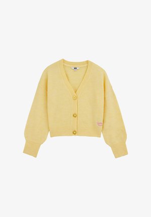 Żółty krótki kardigan z dekoltem w serek, luźnymi rękawami, trzema ozdobnymi kwiatowymi guzikami oraz różowym napisem "Golden" na dole.