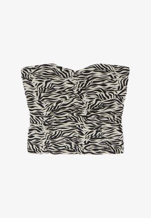 Bandloze cropped top met geplooide details en zwart-wit zebraprint op een effen achtergrond.
