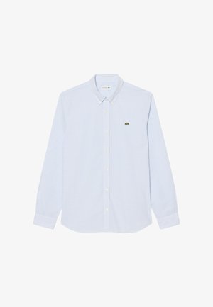 Camicia a maniche lunghe con bottoni in piccolo motivo a quadretti azzurro chiaro e bianco, colletto con bottoni e piccolo logo di un coccodrillo verde sul petto.
