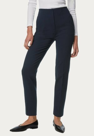 - Spodnie materiałowe