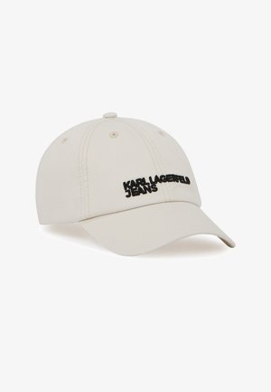 Beige lippalakki, jossa on kaartuva lippa ja musta "KARL LAGERFELD JEANS" -logo brodeerattuna etuosaan.