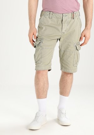 Lyse khaki cargo shorts med flere sidelommer, justerbar talje og lige snit. Fremstillet af bomuldsstof med en blød tekstur.