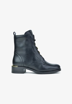 CARAMELO Botines con cordones - black