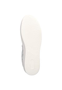 Semelle de sneaker blanche avec un motif de bande de roulement texturé, présentant une surface lisse et un branding subtil. Le matériau semble durable et flexible.