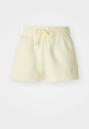 Geltoni medvilniniai šortai su elastingu juosmeniu, reguliuojama virvele, šoninėmis kišenėmis ir mažu sidabriniu logotipu apatinėje užlenkimo dalyje.