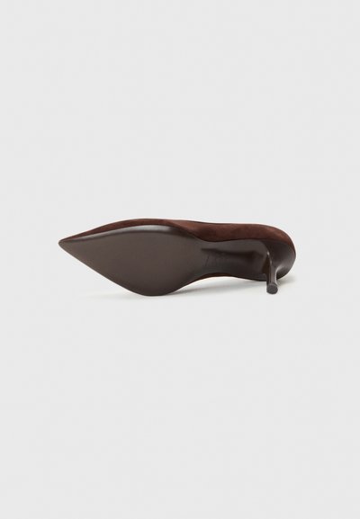 Brown suede high heel shoe with a pointed toe, slim heel, and smooth, rounded sole. Minimalist design with no visible embellishments.