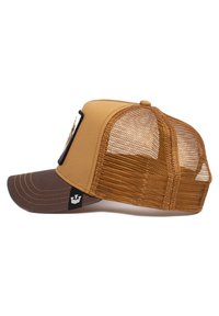 Brown trucker cap with a mesh back, curved visor, and embroidered logo on the front. Features stitching accents in a lighter shade.