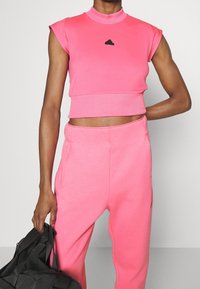 adidas Sportswear Träningsbyxor - pink