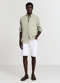 Calliope TASCHE - Shorts di jeans - bianco ottico
