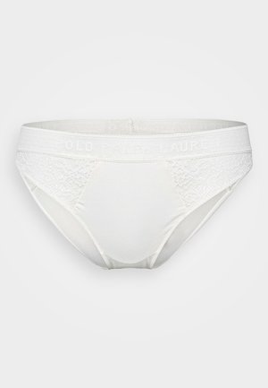 Chiloți albi pentru femei, cu accente din dantelă și un brâu elastic moale, având logo-ul "POLO RALPH LAUREN." Textură netedă și formă ajustată.