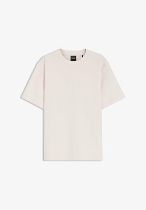 Kurzärmeliges, cremefarbenes Baumwoll-T-Shirt mit Rundhalsausschnitt und einem schwarzen BOSS-Markenetikett innen am Kragen.