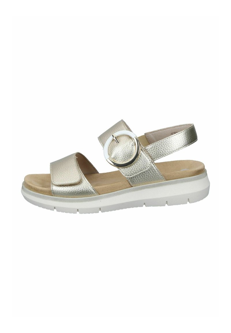 Gold metallic sandals featuring textured straps, a circular buckle, and a cushioned footbed with a white rubber sole.