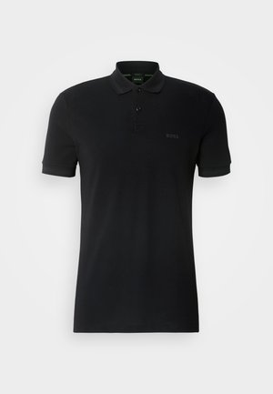 Zwarte polo shirt van katoen met korte mouwen, een klassieke kraag en een twee-knopen-sluiting. Bevat een subtiele logo op de borst.