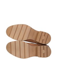 Soletta in gomma marrone con scanalature orizzontali, logo in rilievo e dettaglio a forma di cuore. Progettata con una leggera affusolatura. Finitura liscia e costruzione resistente.