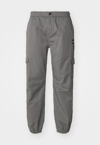 Pantalons cargo gris avec une taille élastique, fermeture à bouton et poches latérales. Le tissu semble léger avec une texture lisse.