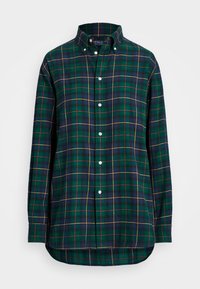 Camicia a quadri verde e blu navy con accenti gialli, colletto button-down, maniche lunghe e orlo arrotondato. Realizzata in un morbido tessuto intrecciato.