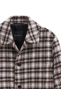 Button-up Hemd im braun-creamfarbigen Hahnentrittmuster, aus strukturiertem Stoff gefertigt. Verfügt über einen klassischen Kragen und das Markenlabel innen.