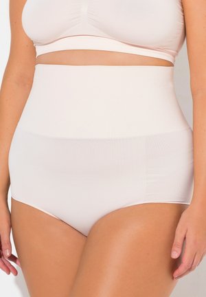 Hochgeschnittene nahtlose Unterwäsche in hellbeige. Glattes, dehnbares Material mit matter Oberfläche. Vollständige Bedeckung mit einem breiten Bund.