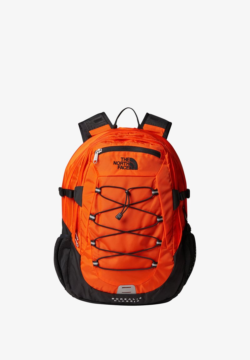 miami orange north face backpack The Hot Shot SE Simply use the webbing straps on the front of the pack The North Face BOREALIS CLASSIC