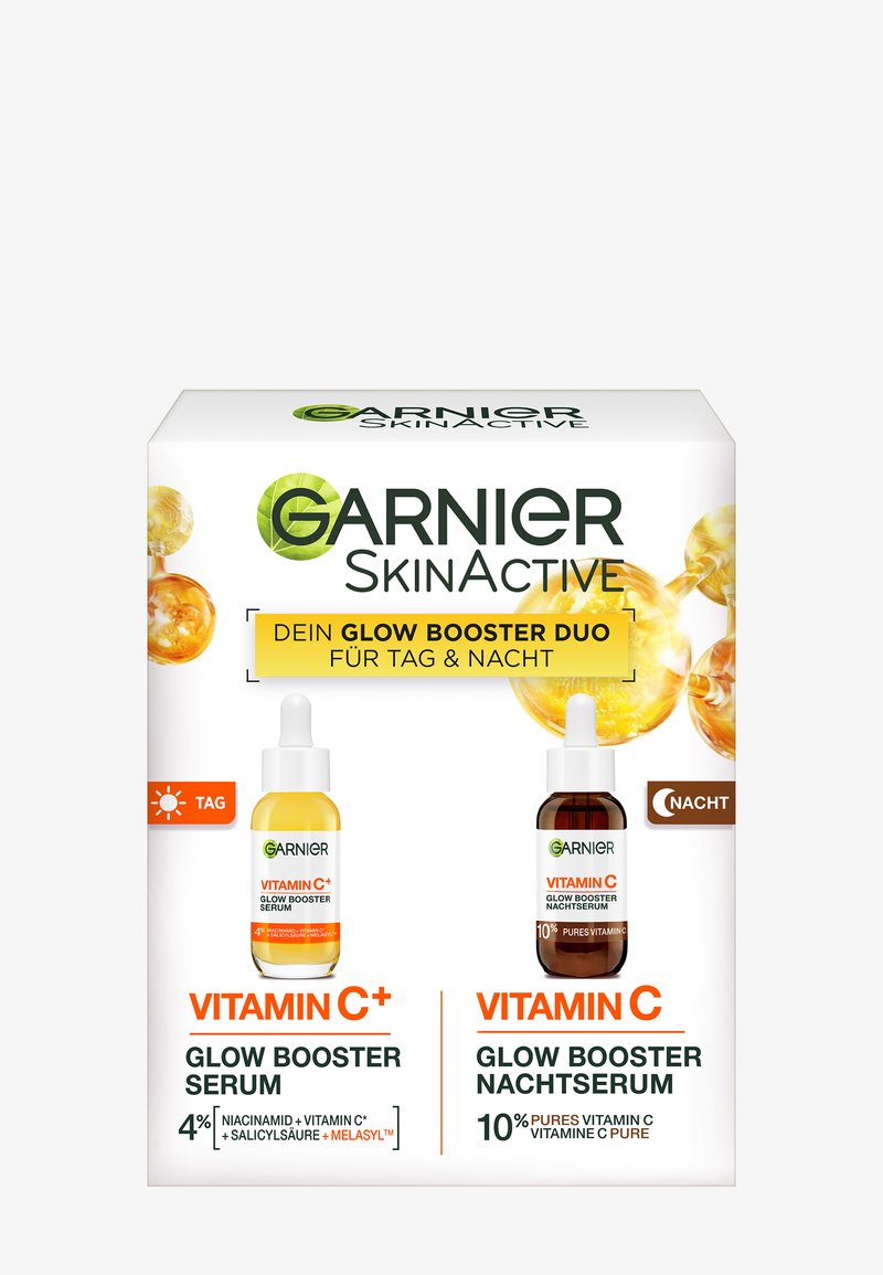 Duo serum Garnier SkinActive Vitamin C+ glow booster na dzień i noc z 4% niacynamidem i 10% czystą witaminą C.