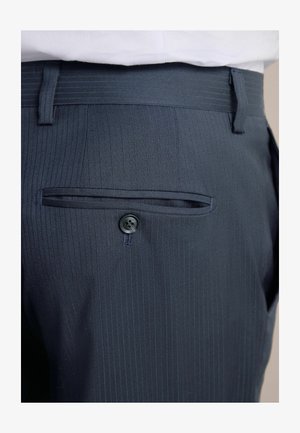 Navy blue pinstriped trousers with a buttoned back pocket and a straight cut. Fabric has a smooth texture and tailored design.