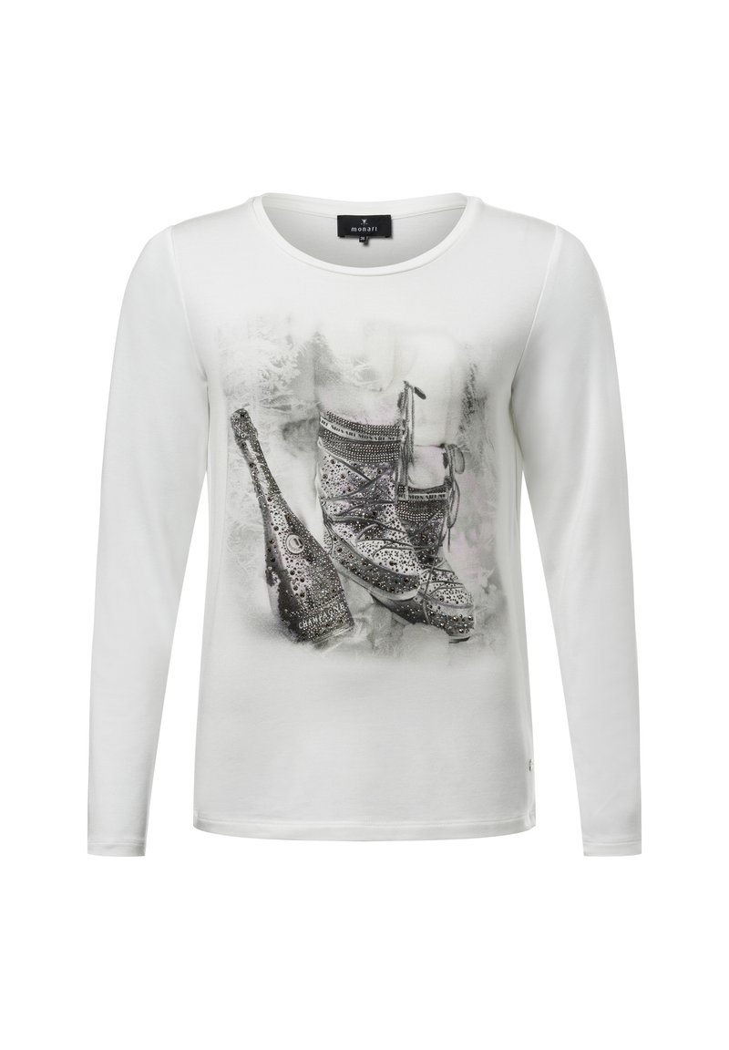 White long-sleeve shirt featuring a printed design of sparkling shoes and a champagne bottle, with a soft texture and crew neckline.