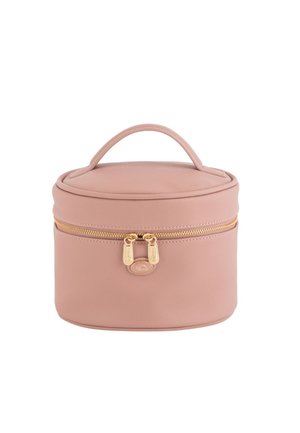 Round, pink cosmetic case made of textured material. Features a gold zipper and hardware, with a small handle on top for easy carrying.
