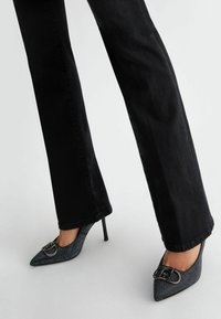 LIU JO WITH BUTTONS - Bootcut-teksad - black
