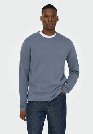 - Sweter