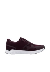 Scarpa sportiva marrone con tomaia in rete, lacci e suola intermedia bianca. Presenta una suola in gomma e dettagli testurizzati per una migliore aderenza.