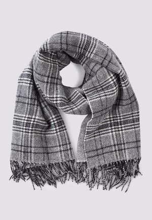 Écharpe tissée à carreaux gris et noirs avec des bords frangés, disposée en boucle lâche sur un fond clair.