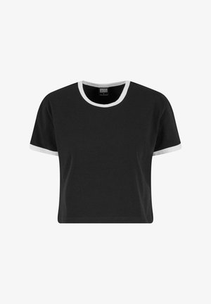 Must have musta musta camisol, valmistatud puuvillast, millel on valge ribareaga kaelus ja varruka servad, lühikesed varrukad ja lõtva istuvuse.