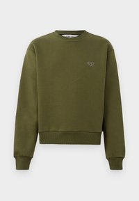 Õlivi roheline särk, ümar kaelus, soonikkoes äärised ja varrukad, millel on väike tikand rinnal. Tasane, mugav disain.